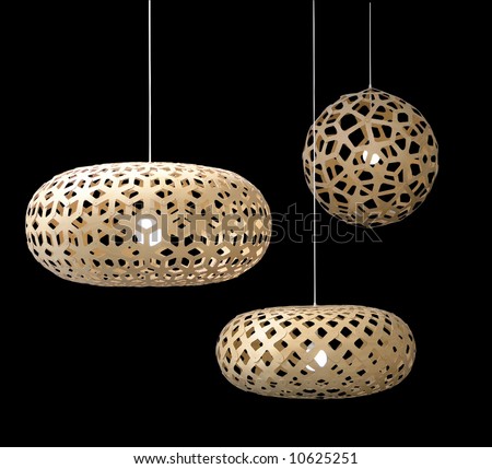Three lampshades isolated over black