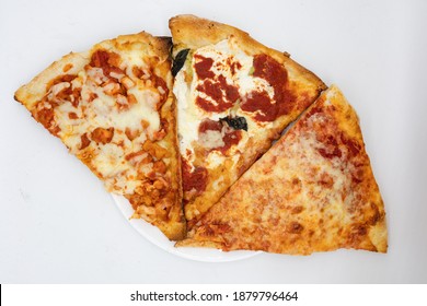 Three Large Slices Of New York Style Pizza With A White Background