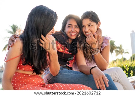 Similar – Happy women looking at camera over garden fence