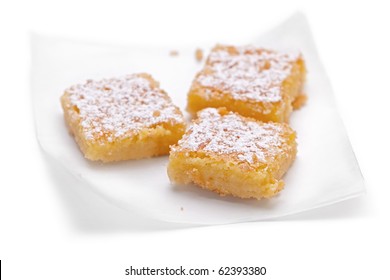 Three Lemon Squares On Paper