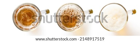 Three Light beer mugs, isolated on white, top view