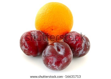 Three lilac plums and orange on overwhite background.