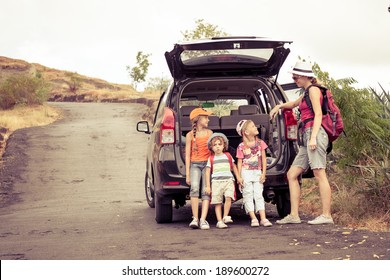 Three Little Kids And Mother In The Mountains