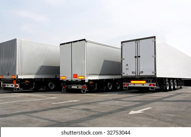 Three Lorries Of Semi Truck At Parking