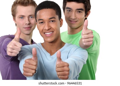 Three Male Friends Giving Thumbs-up
