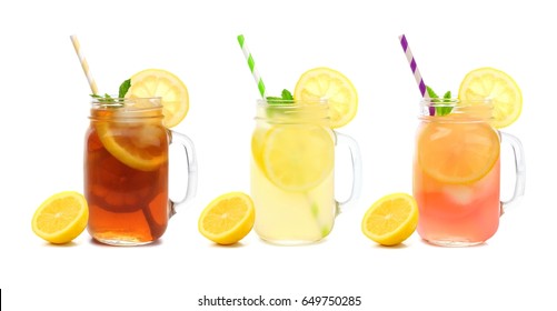 Three Mason Jar Glasses Of Summer Iced Tea, Lemonade, And Pink Lemonade Drinks Isolated On A White Background