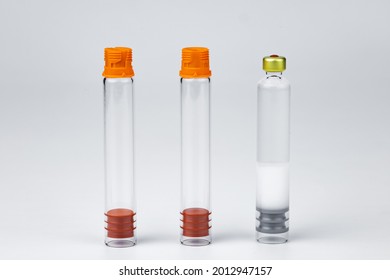 Three medical cartridges on a white background. Insulin medical cartridges for use in insulin syringe pens.