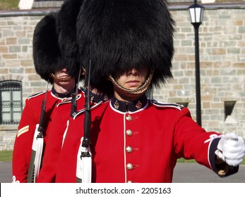 Three Members Of The Canadian Royal 22nd Regiment Changing The Guard At The Citadel In Old Quebec City, Quebec, Canada.