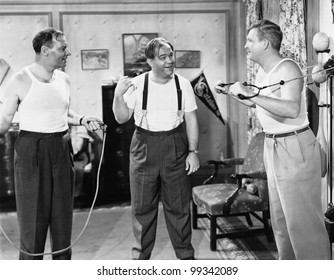 Three men exercising