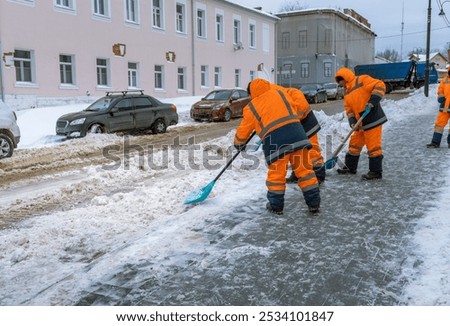 Similar – Image, Stock Photo Three men in orange