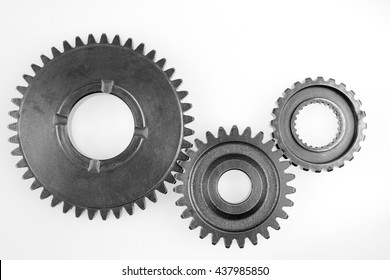 Three metal gears on plain background - Powered by Shutterstock