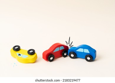 Three Mini Toy Car Crash. Ambulance And Police Car On The Way With Help. Car Incident, To Fast Driving.