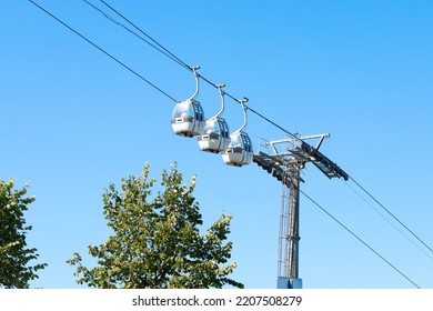 three modern cable cars in Samsun,Turkey. Retro style vintage collection. Nostalgia Time. Turkish name is Teleferik. People ride in cabins on a cable car. - Shutterstock ID 2207508279