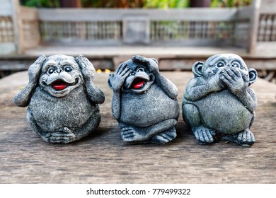 Three monkey,close up of hand small statues with the concept of see no evil, 

hear no evil and speak no evil.