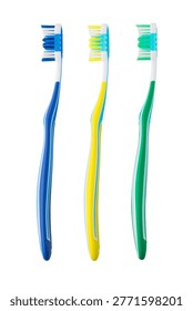 Three multicolored toothbrushes standing vertically for teeth cleaning