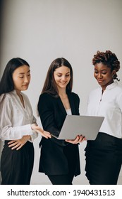 Three Multicultural Business Women Working Together