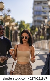 Three Multiracial Co Workers Are Walking Together Towards The Company After Their Break