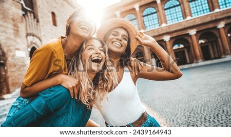 Similar – Image, Stock Photo Happy young woman outdoors in a casual striped dress