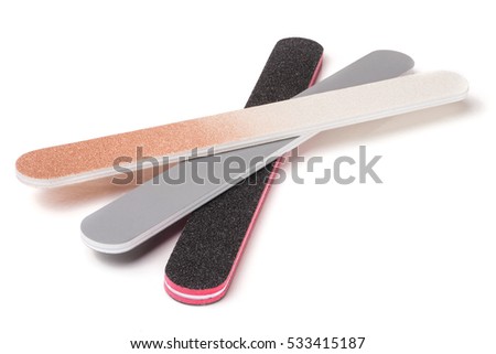 Three nail file with a different abrasive isolated on white background