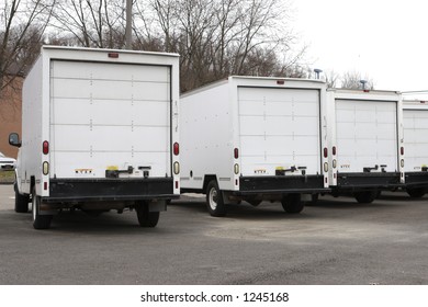 Three New Box Delivery or Moving Trucks