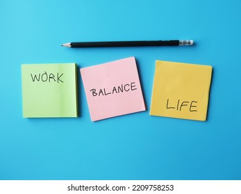 Three Notes On Blue Background With Handwritten Text WORK LIFE And BALANCE In The Middle, Means Equally Prioritizing Work And Personal Life To Maintain Both Professional And Personal Life Efficiently