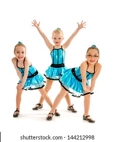 Three Novice Girl Students Pose in Blue Recital Tap Costumes