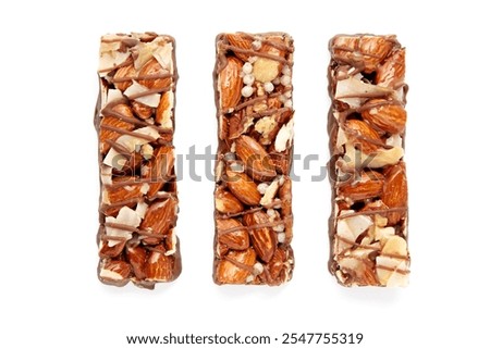 three nutritious protein bars with nuts and caramel and chocolate isolated on white background.