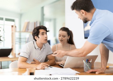 Three office employees read and process documents. Familiarization with contract, business correspondence, letter of claim, employment contract