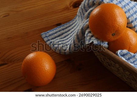 Three oranges on the table