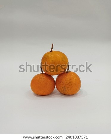 Three Oranges updown isolated on white background 