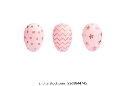 Three painted Easter eggs with golden dots on a white background