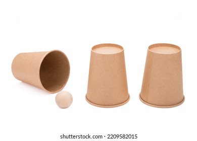 Three Paper Cups And Wood Ball, Guessing Shell Game Equipments, Isolated On White Background