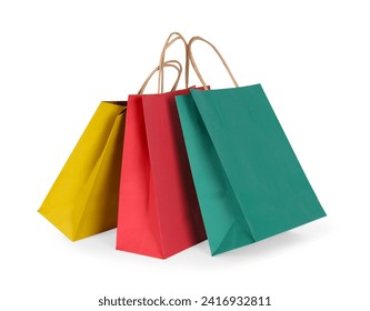 Three paper shopping bags on white background - Powered by Shutterstock