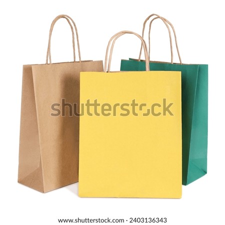 Three paper shopping bags on white background