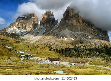 Three peaks over Sella pass in Italian Dolomites Alps, Sassolungo