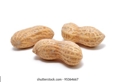 Three Peanuts Isolated On White