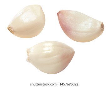 Three Peeled Garlic Cloves, Isolated