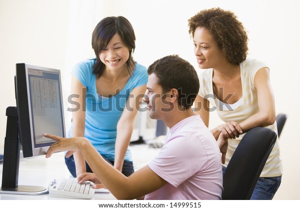 Three People Computer Room Pointing Monitor Stock Photo 14999515 ...
