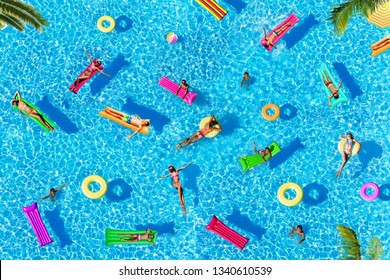 Three People As Pattern Of Many On Water Pool Surface Floating View From Above With Palm Trees