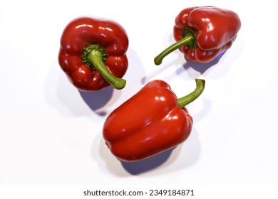 three pepper on white background