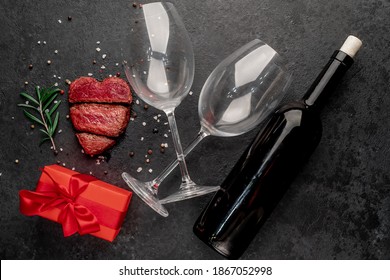 Three Pieces Of Meat. Three Types Of Meat Roasting, Rare, Medium, Well Done Heart-shaped, Bottle Of Wine And Glasses, Gift. Valentine's Day Celebration Concept