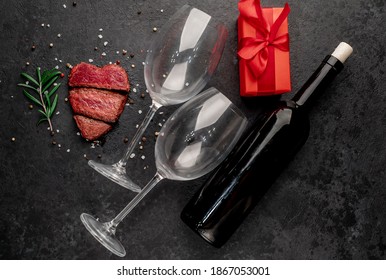 Three Pieces Of Meat. Three Types Of Meat Roasting, Rare, Medium, Well Done Heart-shaped, Bottle Of Wine And Glasses, Gift. Valentine's Day Celebration Concept