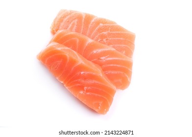 Three Pieces Of Raw Salmon Sushi Sashimi Isolated On White Background