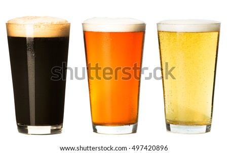 Three pints of craft beer stout ale pilsner lager isolated on white background
