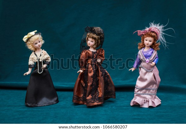 porcelain dolls on stands