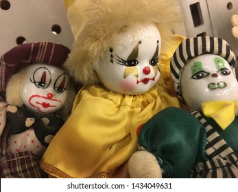 small porcelain clown dolls