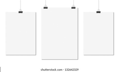 three poster clips on white background