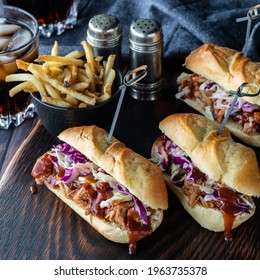 Three Pulled Pork Slider Buns On A Wooden Board Ready For Eating. Instagram Crop.