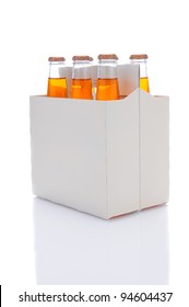 Three Quarters View Of A Six Pack Of Orange Soda Bottles Over A White Background With Reflection.