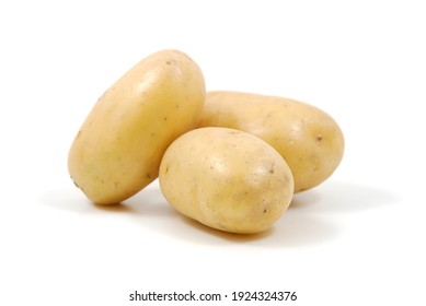 Three Raw Potatoes Isolated On White Background